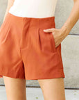 And The Why Every Little Thing Full Size Pleated High Waisted Shorts in Ochre